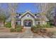 Charming community clubhouse with manicured landscaping and mature trees offering a welcoming entrance for residents at 132 Daniels Ridge Dr, Summerville, SC 29485