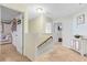 Upstairs hallway with carpet flooring and a decorative cabinet at 132 Daniels Ridge Dr, Summerville, SC 29485