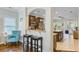 Open-concept kitchen with modern appliances, granite countertops, and breakfast bar at 132 Daniels Ridge Dr, Summerville, SC 29485