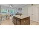 Bright kitchen featuring an island with granite countertops, stainless steel appliances, and a dining area at 132 Daniels Ridge Dr, Summerville, SC 29485