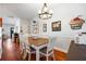 Bright dining room features hardwood floors, modern lighting, and charming decor at 133 Hanahan Plantation Cir, Hanahan, SC 29410
