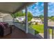 Relaxing front porch features comfortable seating and a peaceful view of the surrounding neighborhood at 133 Hanahan Plantation Cir, Hanahan, SC 29410