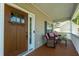 Cozy front porch with outdoor seating, perfect for enjoying the fresh air and neighborhood views at 133 Hanahan Plantation Cir, Hanahan, SC 29410