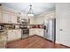 Spacious kitchen features stainless steel appliances and beautiful hardwood floors at 133 Hanahan Plantation Cir, Hanahan, SC 29410