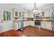 Well-lit kitchen features stainless steel appliances and access to backyard at 133 Hanahan Plantation Cir, Hanahan, SC 29410