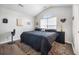 Serene main bedroom with vaulted ceilings features neutral decor, cozy rug, and ample space for relaxation at 133 Hanahan Plantation Cir, Hanahan, SC 29410