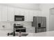Modern kitchen features new appliances, and white cabinets at 1362 Palm Cove Dr, Charleston, SC 29492