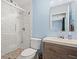 Modern bathroom with a walk-in shower featuring subway tile and a stylish vanity and basin at 1379 Downsberry Dr, Mount Pleasant, SC 29466