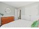 Light-filled bedroom with a geometric style bedspread, spacious closet and stylish decor at 1379 Downsberry Dr, Mount Pleasant, SC 29466