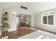 Open-concept living room with tile floors, high ceilings, and an open layout great for entertaining at 1379 Downsberry Dr, Mount Pleasant, SC 29466