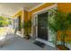 Charming front porch with rocking chairs and well-manicured plants at 1440 Teaberry Path, Charleston, SC 29414