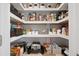 Organized walk-in pantry with ample shelving, baskets, and storage containers at 1440 Teaberry Path, Charleston, SC 29414