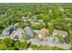Aerial view of the community showing the pool and surrounding residences nestled among lush trees at 1530 Fort Johnson Rd # 3C, Charleston, SC 29412