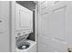 Convenient laundry area with stacked washer and dryer units, maximizing space efficiency at 1530 Fort Johnson Rd # 3C, Charleston, SC 29412