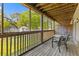 Screened-in patio with wood flooring and views, offering space for outdoor seating at 1530 Fort Johnson Rd # 3C, Charleston, SC 29412