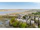 Aerial shot showcasing waterfront properties, coastal charm, and serene marsh views at 158 Mary Ellen Dr, Charleston, SC 29403