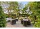 Aerial view of backyard features a patio, outdoor bar area, green lawn, and access to the main house at 158 Mary Ellen Dr, Charleston, SC 29403