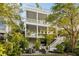 Multi-level deck and patio showcasing the home's outdoor living space and mature landscaping at 158 Mary Ellen Dr, Charleston, SC 29403