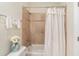 Inviting bathroom showcasing a tiled shower with a tub and decorative accents at 158 Mary Ellen Dr, Charleston, SC 29403