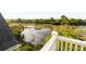 Scenic marsh view from a balcony overlooking tranquil waters and lush greenery at 158 Mary Ellen Dr, Charleston, SC 29403