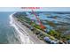 Aerial view of 1604 E Ashley Ave home next to the marsh and beach at 1604 E Ashley Ave, Folly Beach, SC 29439