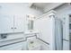 Classic bathroom features a vanity, mirror, and a shower with curtain at 1604 E Ashley Ave, Folly Beach, SC 29439