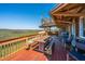 Outdoor deck with a wood table and views of the marsh at 1604 E Ashley Ave, Folly Beach, SC 29439