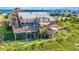 Coastal home with multi-tiered decks perfect for outdoor living with ocean view and easy beach access at 1604 E Ashley Ave, Folly Beach, SC 29439