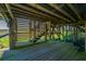 Underside of deck with wooden staircase at 1604 E Ashley Ave, Folly Beach, SC 29439