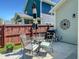 Outdoor patio featuring a grill, dining furniture, and decor for entertaining and relaxation at 1673 Emmets Rd, Johns Island, SC 29455