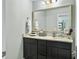 Bathroom featuring vanity with modern fixtures and large mirror at 1673 Emmets Rd, Johns Island, SC 29455