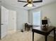 Bedroom with neutral carpet with view of a doorway, window, desk and ceiling fan at 1673 Emmets Rd, Johns Island, SC 29455
