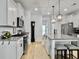 Well-equipped kitchen with an island, stainless appliances, and ample counter space at 1673 Emmets Rd, Johns Island, SC 29455