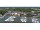 An aerial perspective shows boats docked in the marina, alongside the commercial buildings and parking areas at 1880 Andell Bluff Blvd # Slip E 9, Johns Island, SC 29455