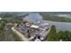 The aerial view shows boats docked at the marina, a parking lot, and the roof of Bohicket Marina at 1880 Andell Bluff Blvd # Slip E 9, Johns Island, SC 29455