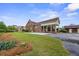 Backyard featuring a pool and expansive lawn, perfect for outdoor activities at 200 Broughton Rd, Moncks Corner, SC 29461