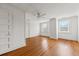 Bedroom with hardwood floors, neutral walls, ceiling fan and large windows at 200 Broughton Rd, Moncks Corner, SC 29461