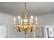 Close up of a dining room chandelier at 200 Broughton Rd, Moncks Corner, SC 29461