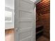 Bedroom with opened door to closet with wood walls and racks at 200 Broughton Rd, Moncks Corner, SC 29461