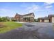 Charming brick home featuring a covered porch and pool at 200 Broughton Rd, Moncks Corner, SC 29461
