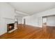 Spacious living room with hardwood floors and traditional fireplace at 200 Broughton Rd, Moncks Corner, SC 29461