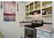 Functional kitchen featuring modern stainless steel oven, tile backsplash, and ample counter space at 201 Judith Dr, Summerville, SC 29485