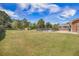 Large backyard with a fenced-in pool and ample green space at 208 Mini Farm Rd, Bonneau, SC 29431