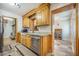 Eat-in kitchen featuring stainless steel appliances, granite countertops, and custom cabinets at 208 Mini Farm Rd, Bonneau, SC 29431