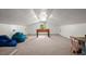 Bonus room featuring sloped ceilings, recessed lighting, and a foosball table for entertainment at 23 Hunters Forest Dr, Charleston, SC 29414
