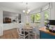 Breakfast nook features a bay window, chandelier, and is adjacent to the living room at 23 Hunters Forest Dr, Charleston, SC 29414