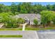 Aerial view of a community clubhouse with well-manicured landscaping and convenient parking at 23 Hunters Forest Dr, Charleston, SC 29414