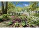 Charming single-story home with manicured landscaping and blooming azaleas in the front yard at 23 Hunters Forest Dr, Charleston, SC 29414