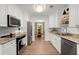 Bright kitchen features stainless steel appliances, granite countertops, and open floor plan at 23 Hunters Forest Dr, Charleston, SC 29414