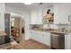 Kitchen features granite countertops, stainless steel appliances, and opens to a dining area at 23 Hunters Forest Dr, Charleston, SC 29414